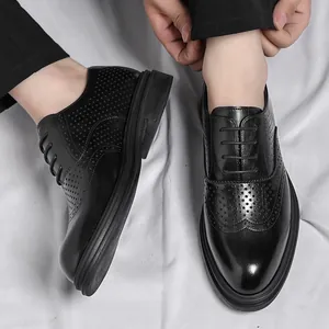 Classic black Brogue elevator shoes for men with breathable cut-outs and lace-up design