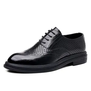 Classic black leather brogue shoes with breathable perforations and non-slip rubber soles