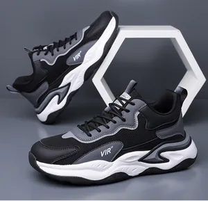 Detail of breathable black mesh sneakers with VIR lettering and wave-shaped sole