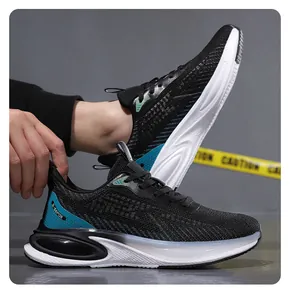 Detailed side view of breathable black mesh running shoe with blue accents and thick sole