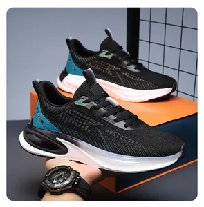 Detailed side view of breathable black mesh upper with cyan TPU accents and orange sole