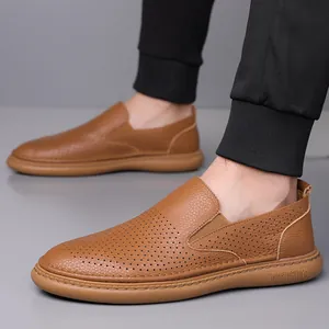 Brown perforated leather loafers for men featuring a breathable slip-on design and soft sole