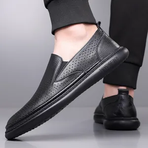 Men's black leather slip-on loafers with breathable perforations and thick rubber sole