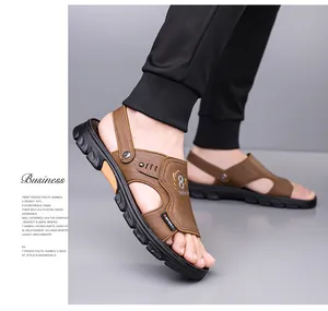 Men's brown leather sandals with soft latex sole and orange side accents on model
