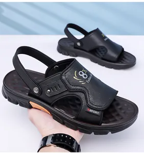 Detailed view of the dual-use men's black sport sandal with 8X Fashion Sport text