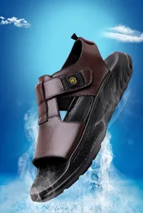 Detail view of men's brown leather sandals featuring a non-slip thick sole and velcro straps