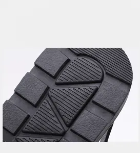 Detail of high-density rubber sole with non-slip texture for wear-resistant beach sandals