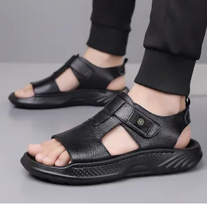 Close-up of black leather men's sandal with adjustable velcro strap and textured platform