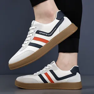 Sneaker casual da uomo con strisce blu-arancio e suola in gomma marrone