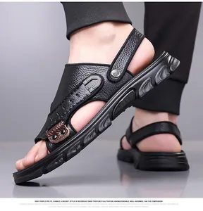 Detail of men's black leather dual-use sandals showing the adjustable heel strap and thick sole