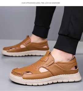 Detail of brown leather sandals featuring breathable hollow-out design and durable hand-stitching