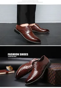 Detail of reddish-brown brogue leather shoes with intricate perforated wingtip patterns