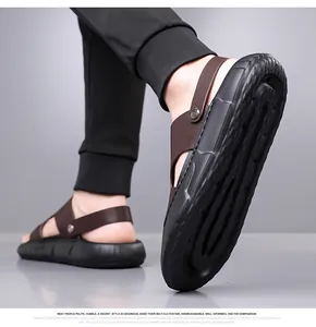 Detail view of men's leather beach sandals featuring anti-slip soles and rustic texture