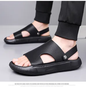Close-up of black leather men's sandals with breathable cutouts and sporty non-slip soles