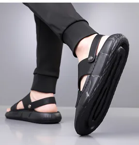 Close-up of black leather sandals with rotating heel strap and anti-slip thick sole