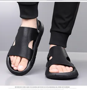 Close-up of black leather dual-use men's sandals featuring adjustable heel strap