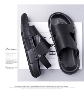 Detail of men's leather business sandals featuring lychee texture and dual-purpose heel strap