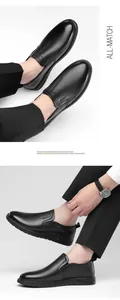 Close-up of black genuine leather slip-on loafers with RINIRO branding and soft soles