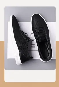 Détail de la tige en maille noire respirante et de la semelle blanche légère de chaussure
