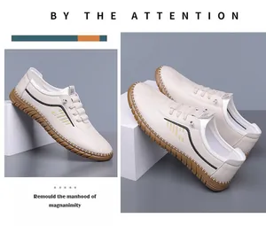 Detail view of beige leather loafers featuring contrast stitching and soft rubber soles