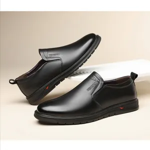 Men's premium black leather slip-on loafers with flexible soles and textured finish