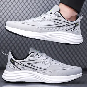 Detail of light grey breathable mesh running shoes with cushioning EVA sole for men