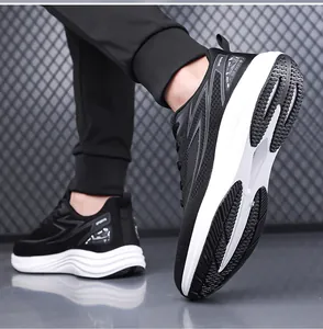 Detail shot of men's running shoe showing non-slip wave sole and breathable mesh fabric