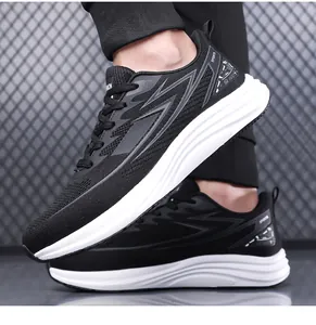 Detail view of breathable knit mesh upper and anti-slip rubber sole of men's running shoe