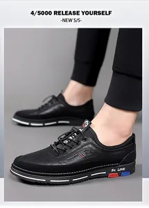 Dettaglio laterale di scarpe casual in pelle nera con suola decorativa 5G LOVE