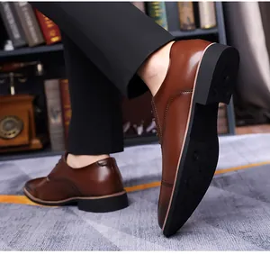 Detailed view of brown leather business shoe showing the non-slip sole and stitching