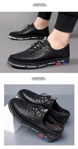 Dettaglio di scarpe casual in pelle nera da uomo con stampa 5G LOVE sulla suola
