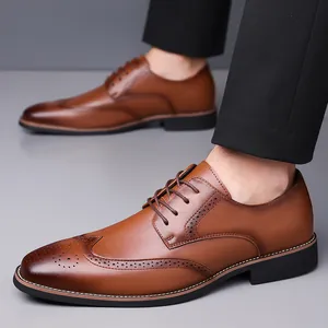 Brown wingtip brogue dress shoes with classic gradient finish for formal business wear