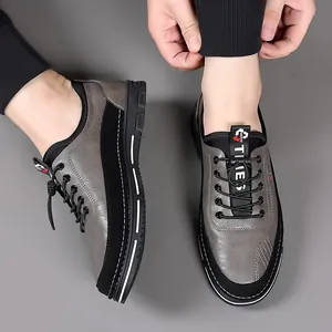 Scarpe casual da uomo in pelle grigia con trama testurizzata e design senza lacci
