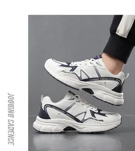 Close-up of white mesh and navy blue synthetic leather on breathable jogging sneakers