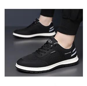 Detail view of men's black breathable mesh sneaker with side leather panels and trend logo