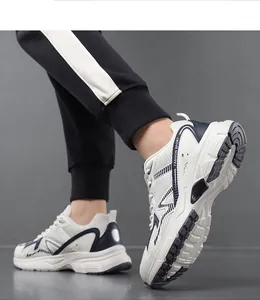 Detail of breathable white and navy mesh sports shoes for men, lightweight design