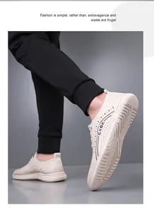 Detailed side view of beige men's casual shoes showing breathable hollow perforations