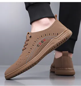 Close-up of men's brown hollowed breathable leather casual shoes with non-slip sole