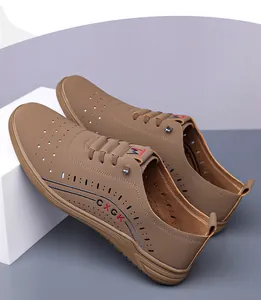 Detail of breathable perforated brown leather men sandals with soft non-slip sole