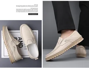 Close-up of men's cream leather loafers with non-slip thick rubber soles and stitching