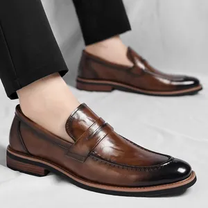 Classic British style men's brown gradient leather loafers with polished toe cap detail