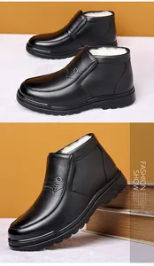 Detail of men's winter leather boots showing thick warm fleece lining and black texture