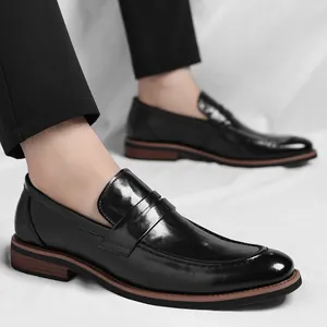 Classic black leather loafers for men with slip-on design and stylish dual-color sole