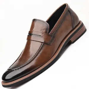 Deep brown gradient leather loafers with polished finish and classic saddle strap detail