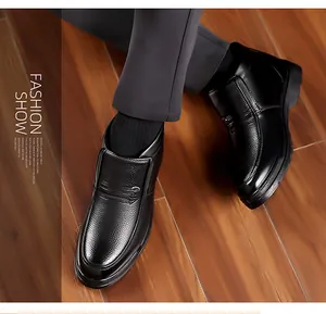 Detailed view of black grain leather upper with lychee texture and metal buckle detail