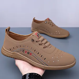 Brown hollow-out leather men's sandals with breathable perforations and soft non-slip sole