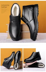 Detail of men's winter high-top leather boots with thick faux fur lining and buckle