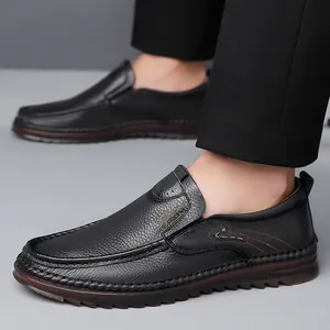 Men's black leather loafers with slip-on design and durable non-slip rubber soles
