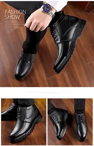 Detailed side view of men's black leather high-top boots with pebble grain texture and rubber sole