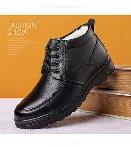 Detail of high-top black leather men's winter boots with thick white faux fur lining